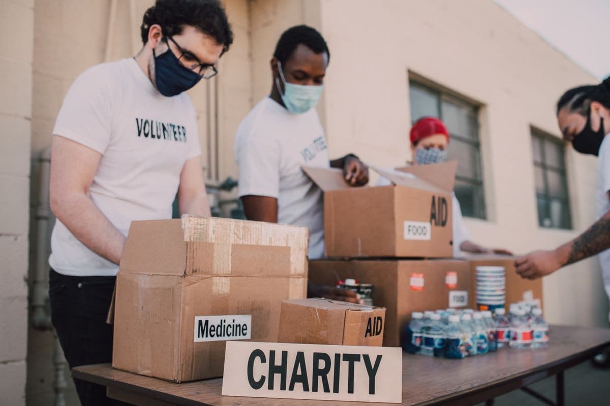 Volunteers organizing donation boxes
